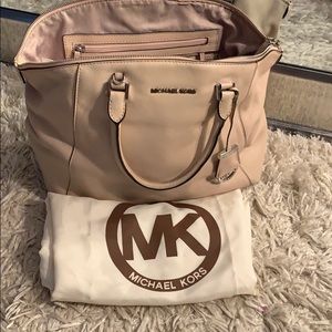 Ballet pink purse by Michael Kors.